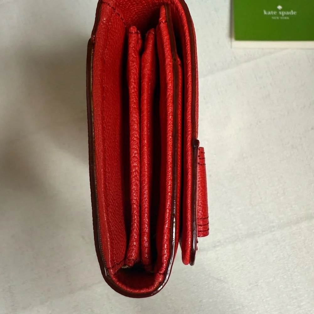 Kate Spade Silver and Red Detail